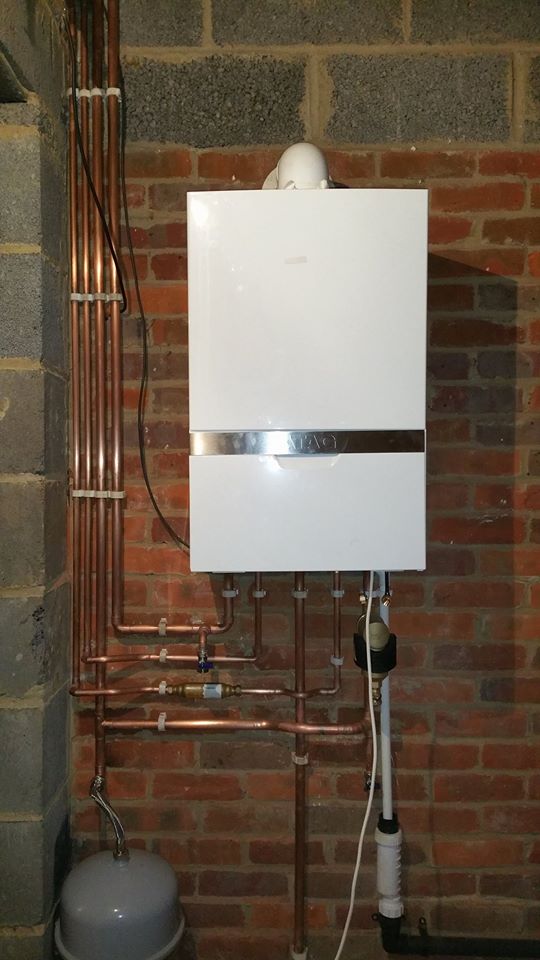Home Comfort Assured engineer carrying out heating system checks